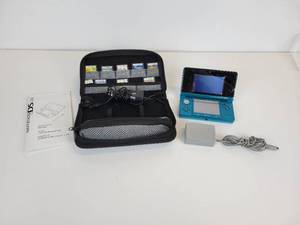 lot 480 image: Nintendo 3DS with 8 Games and Charger Cord and Car Charger