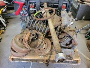 lot 26 image: Pallet of IMCA Hobby Stock Parts - From a 1985 Monte Carlo - Ford 9 Rear, Control Arms, Springs, Shocks, Drive Shaft, 31 Spline Axles, Intake and More - NO SHIPPING