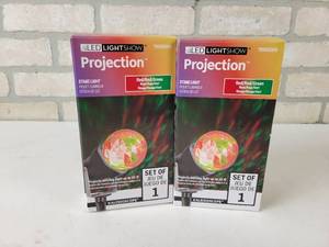 lot 228 image: (2) NEW LED Light Show Projection Stake Lights