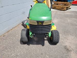 lot 16 image: John Deere LT133 Lawnmower - John Deere C-Series 13hp Engine, Includes Bagger Assembly - Currently NOT Running - NO SHIPPING