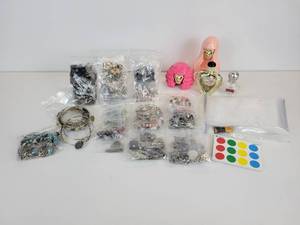 lot 738 image: Lot of Jewelry, Perfume Bottles, Plastic Zipper Bags, and More
