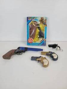 lot 745 image: Lot of Toy Guns - Squirt Guns, Click Guns, and More