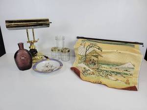 lot 750 image: Lot of Home Dcor - Brass Desk Lamp, Asian-Inspired Tapestry, Unique Ash Tray, and More
