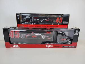 lot 859 image: Pair of Hy-Vee Die Cast Vehicles, Rahal Letterman Lanigan - Green Light 164 Scale Diecast Kenworth T2000 Team Transporter and New Ray Toys 132 Diecast Kenworth & Trailer Indy Car Hauler
