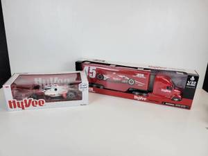 lot 858 image: Pair of Hy-Vee Die Cast Vehicles, Rahal Letterman Lanigan - Green Light 118 Scale Indy Car and New Ray Toys 132 Diecast Kenworth & Trailer Indy Car Hauler
