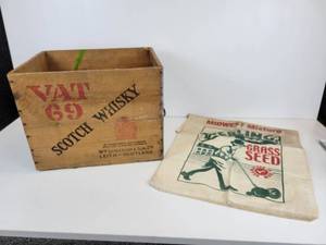 lot 879 image: Vat 69 Scotch Whisky Crate and Northrup King Sterling Grass Seed Sack