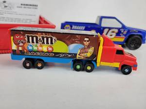lot 888 image: Lot of Kids Toys - Dora the Explorer Dominoes and Card Games, Napa Pickup Race Truck, and M&Ms Candy Dispenser Truck
