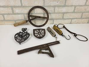 lot 616 image: Vintage STANLEY No. 21 Square, Wagon Wheel Measuring Tool, Trivet, Iron Stand and More