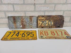 lot 657 image: 1963 Mobile Home MN License Plate, 1954 MN Trailer License Plate, 1952 MN License Plate and 1974 MN License Plate