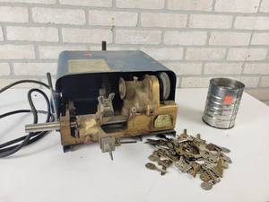 lot 577 image: Vintage Key Cutter Machine and Assorted Blanks - tested and runs - NO SHIPPING