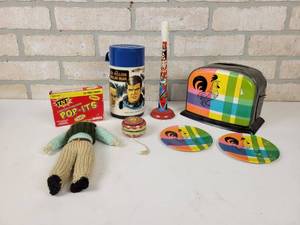 lot 781 image: Six Million Dollar Man Thermos, Tin Toy Toaster, Yo-Yo and More