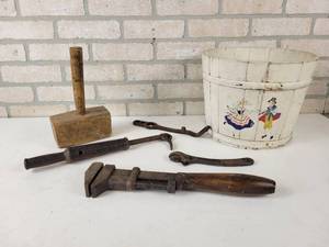 lot 524 image: Lot of Antique Tools - Wood mallet, GIANT Nail Puller, Bergman Tool Mfg. Co. Adjustable Wrench, COES Wrench Co Monkey Wrench and Wood Planter