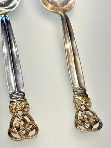 lot 8AA image: Two Sterling Silver Towle Celtic Gold Weave Serving Spoons