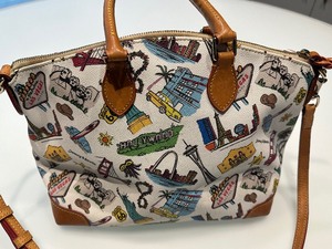 lot 70 image: Dooney and Bourke Landmark Shopping Handbag