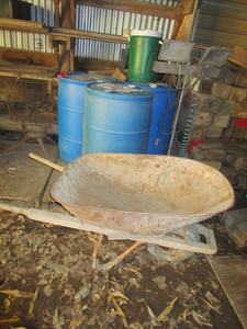 lot 123 image: Wheel Barrow, Shop Light, Fuel Drums