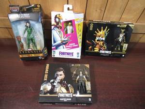 lot 56 image: Lot of FOUR Action Figures