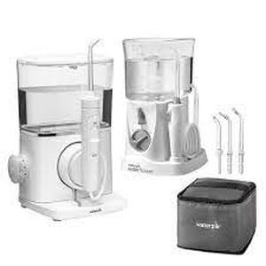 lot 2 image: Waterpik Evolution and Nano Water Flosser Combo Pack