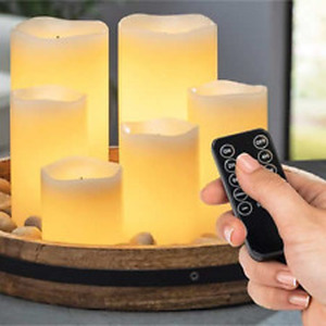 lot 76 image: Glow Wick LED Candles Multifunction Remote Control 8 Color Choices 6 Pack