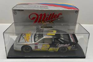 lot 28 image: NASCAR 124 Scale Die-Cast #2 Miller Genuine Draft ( Rusty Wallace ) Stock Car Replica With Stand And Display Case ( Limited Edition )