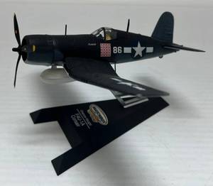 lot 37 image: Matchbox Collectibles Miniature Diecast Plane ( Chance-Vought F4U-1A Corsair ) On Stand 5 12 x 6 34