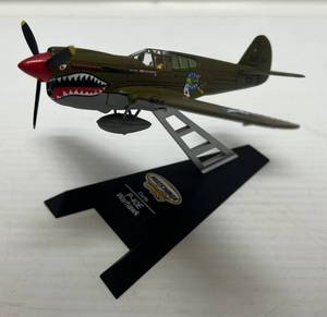 lot 38 image: Matchbox Collectibles Miniature Diecast Plan ( Curtis P- 40E Warhawk ) On Stand 5 12 x 6 14