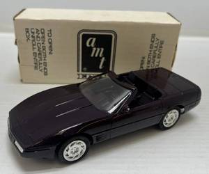 lot 75 image: Ertl AMT ( Dealer Promo ) 1992 Chevrolet Corvette Convertible ( Black Rose Metallic )
