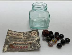 lot 128 image: Group Of Very Unique Vintage Marbles With Arcade Marbles Advertisement