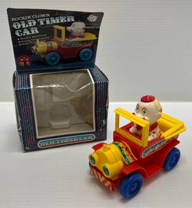 lot 215 image: Vintage Rockin Clown old Timer Car In Original Box