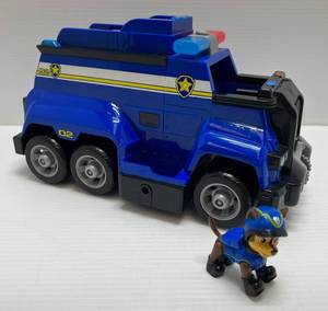 lot 292 image: Vintage Paw Patrol Action Figure Vehicle Chases Police Car With Chase Figure