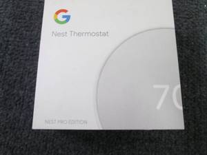 lot 6 image: Google Nest Smart Thermostat open b...