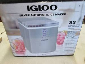 lot 96 image: Igloo 33-Lb. Ice Maker - Silvertone...