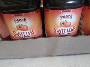 lot 106 image: 8- 64 oz Bottles Peach Sweet Leaf T...