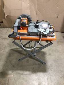 lot 3 image: RIDGID 9 Amp Corded 7 in. Wet Tile Saw with Stand Customer Returns See Pictures