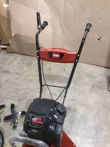 lot 4 image: Toro 21 in. Max Tilling Width 163 Briggs and Stratton 4-Cycle Engine Front Tine Tiller  Customer Returns See Pictures