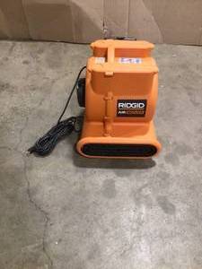 lot 20 image: RIDGID 1625 CFM 3-Speed Portable Blower Fan Air Mover with Collapsible Handle and Rear Wheels for Water Damage Restoration Customer Returns See Pictures