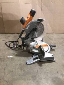 lot 30 image: RIDGID 15 Amp 10 in. Corded Dual Bevel Miter Saw with LED Cut Line Indicator  Customer Returns See Pictures