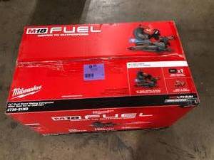 lot 18 image: Milwaukee M18 FUEL 18V Lithium-Ion Brushless Cordless 12 in. Dual Bevel Sliding Compound Miter Saw Kit with One 12.0Ah Battery   Customer Returns See Pictures