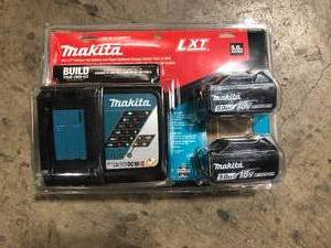 lot 39 image: Makita Powewr Tool Batteries 5.0Ah 18-V Li-Ion  Optium Charger Starter Pack Customer Returns See Pictures