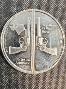 1 TROY OZ .999 FINE SILVER GUNS UP AMERICA ROUND