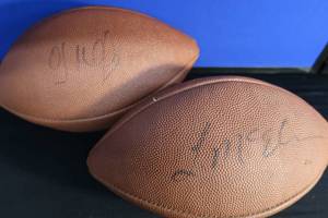 2 UNKNOWN AUTOGRAPHED FOOTBALLS