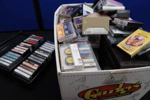 JUMBO BOX OF MIXED CASSETTES AND VHS