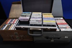 VINTAGE CASSETTE TAPES 3 CASES. 2 OF THEM ARE DOUBLE CASES
