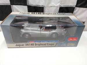 lot 3 image: Sun Star 118 Scale Model Jaguar X K 140 Coupe