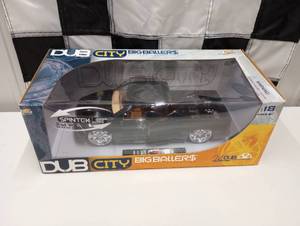 lot 26 image: Dub City Big Ballers 118 Scale Die Cast Dodge Ram