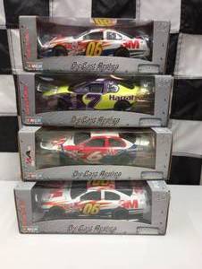 lot 57 image: Team Caliber Pit Stop 124 Scale Die Cast Stock Cars