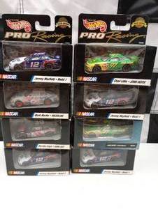 lot 92 image: Assorted Hot Wheel Pro Racing Track Edition 143 Scale Die Cast Cars