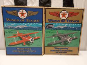 lot 101 image: Two Ertl Wings Of Texaco Die Cast Planes