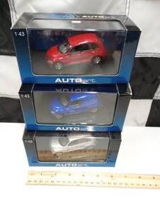 lot 132 image: Three  Autoart 143  Scale PT Cruisers Die Cast Cars
