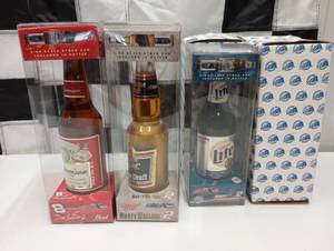 lot 167 image: Action Racing Replica Beer Bottles With 164 Scale Stock Car Inside Bottle