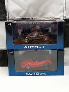 lot 390 image: Autoart 143rd Scale Die Cast Cars